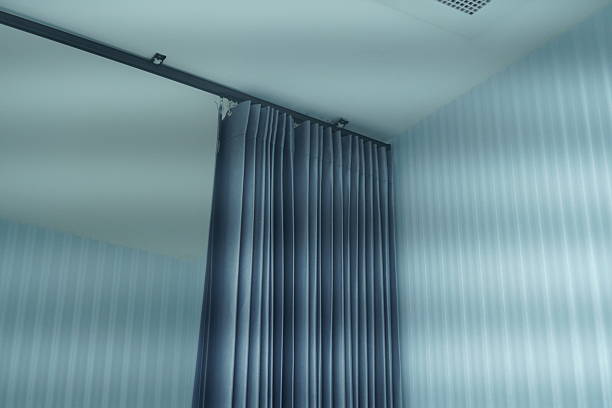 Securing a Curtain Rod in Drywall Without Studs