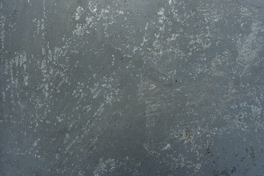 Can I Successfully Coat Over Painted Concrete?