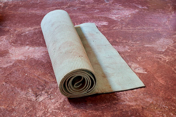 The Best Way to Anchor an Oversized Rug to Your Floor